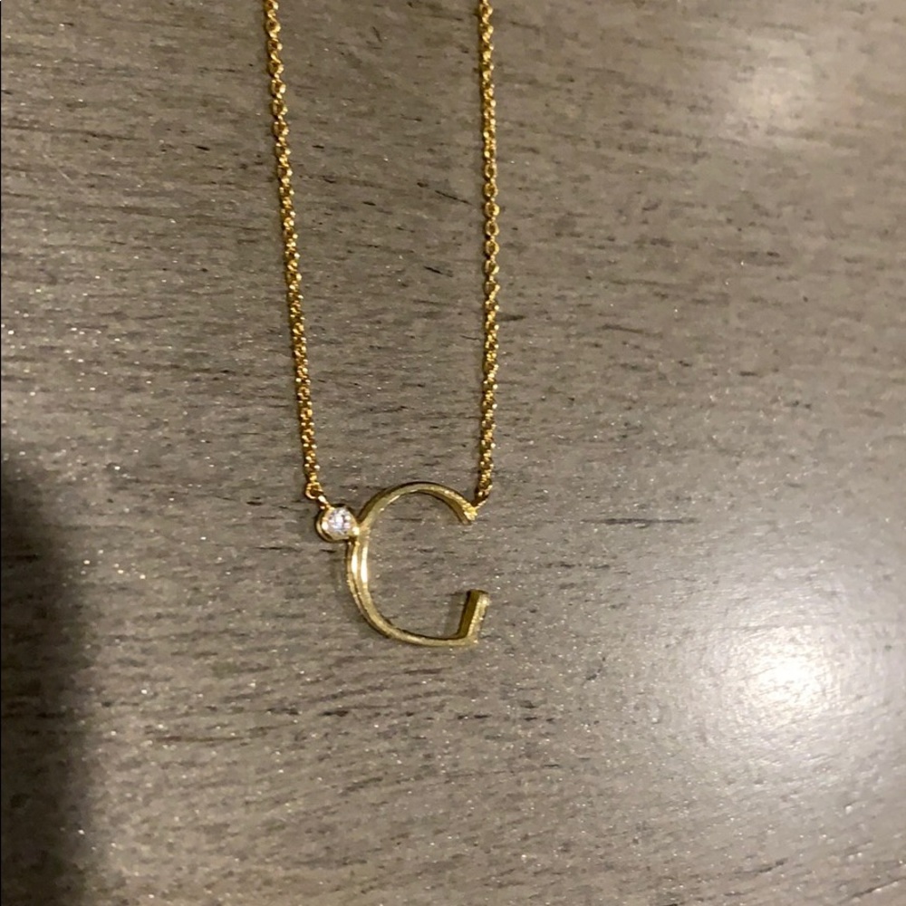 NWT Anthropologie Monogram “G” necklace in gold.